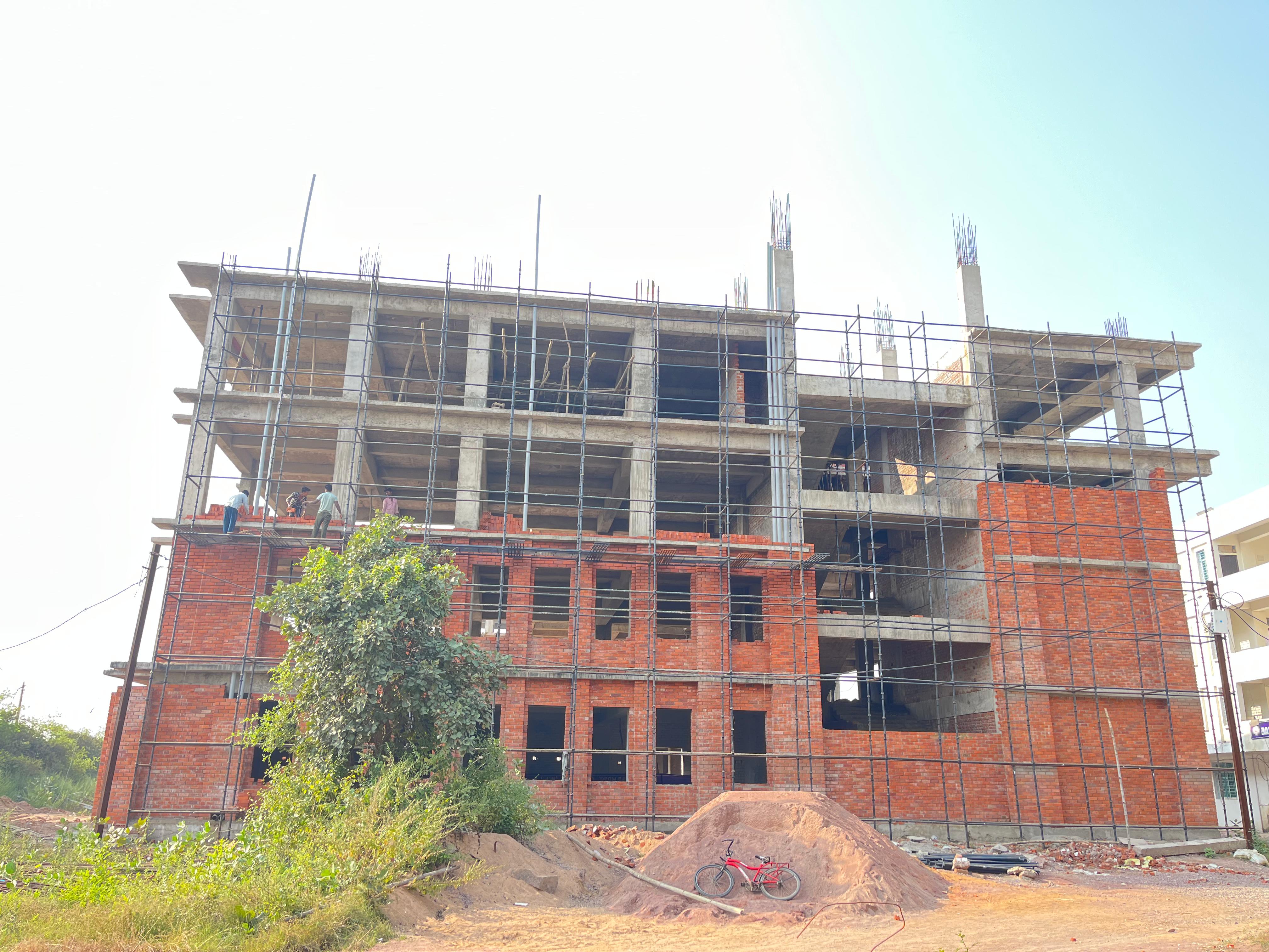 Large commercial building with wire cut bricks — Bricks Street