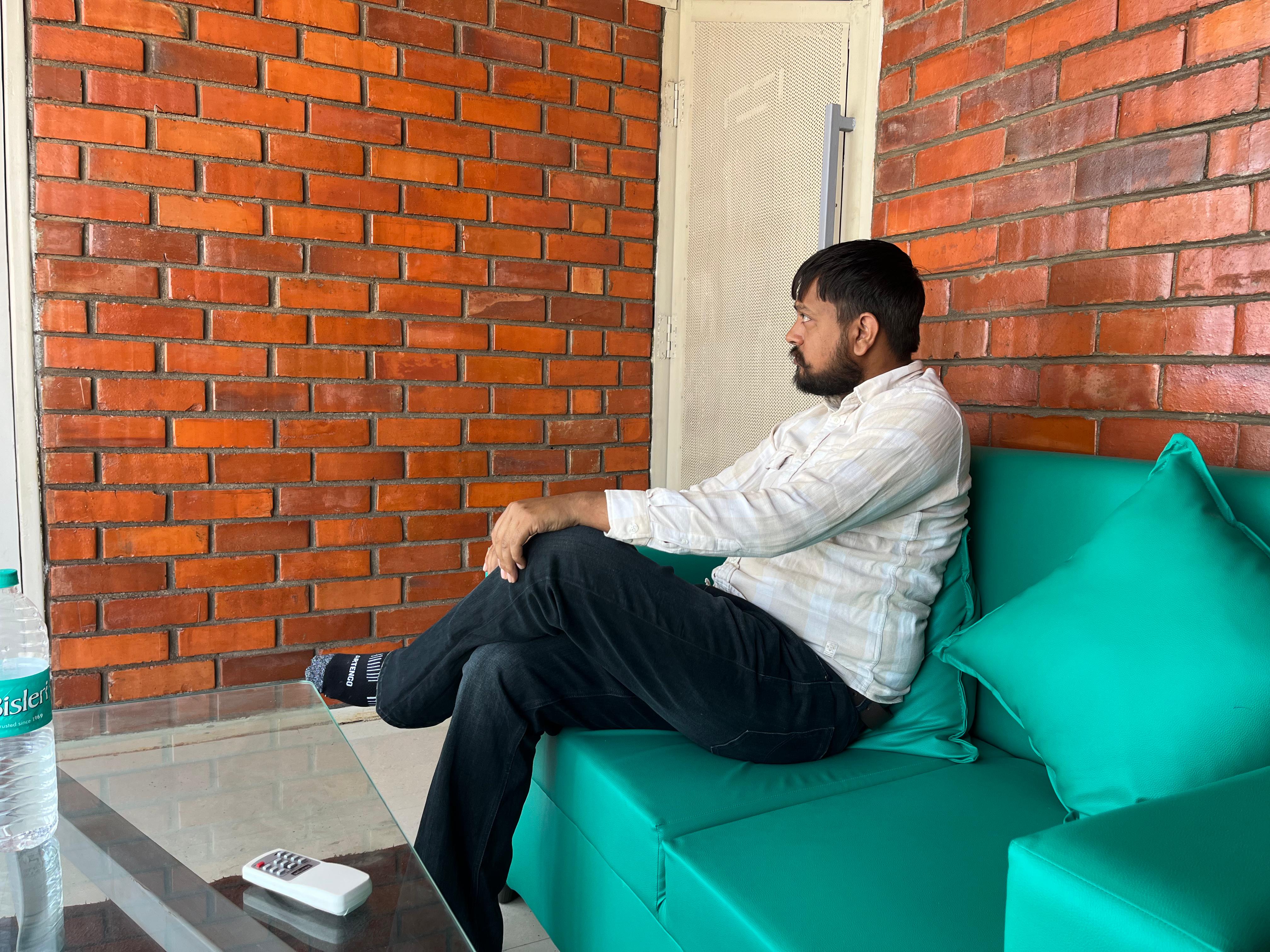 Living room with exposed wire cut brick wall — Bricks Street